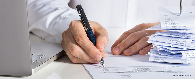 Property manager analyzing monthly accounting and charges after rent collection